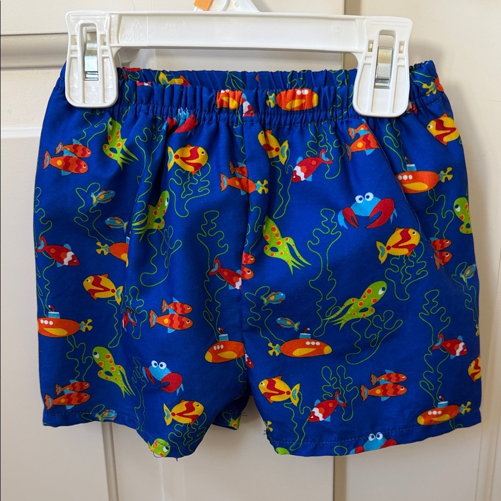 Blue Kids Swim Trunks with Colorful Fish Print for size 18-22 pds/6- 12 months.